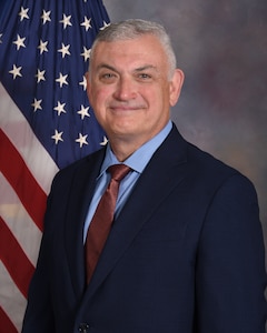 Mr. Brian Mansfield