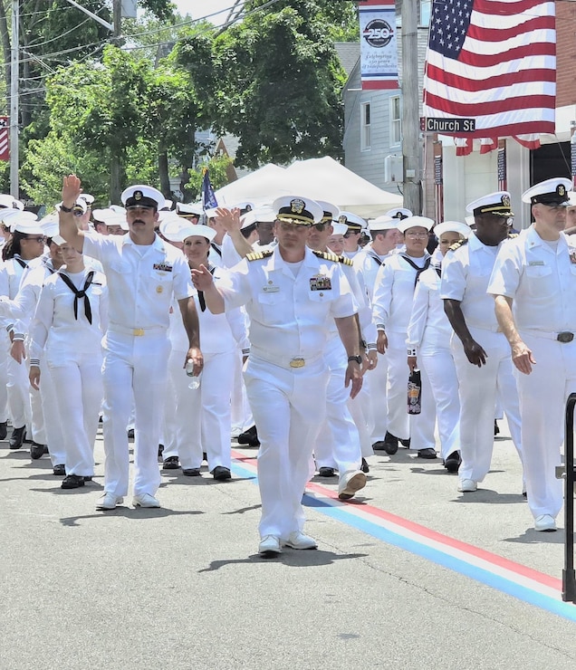 Captain Henry Roenke, installation commanding officer, led the Navy Division of the Bristol Fourth of July Celebration on its historic 241st parade through the town. Joining the marching units were members of the crew from visiting warship USS Wichita (LCS 13), Officer Development School at Officer Training Command Newport, and U.S. Navy Supply Corps School. The Bristol parade is the oldest, continuously held 4th of July parade in the nation.