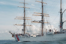 A boat sails in the Charleston Harbor.