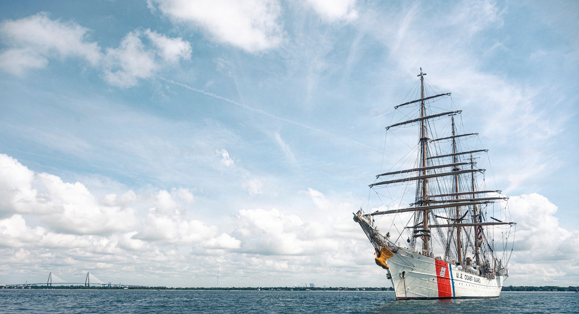 A ship sails in the Charleston Harbor.