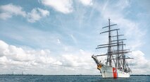 A ship sails in the Charleston Harbor.