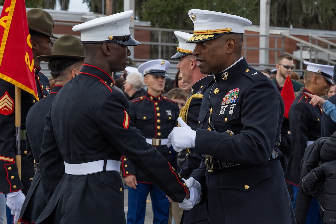 U.S. Marine Corps Pfc. Bienvenue Niyonkuru, a guide with Hotel Company, 2nd Recruit Training Battalion, graduates from training on Marine Corps Recruit Depot Parris Island, S.C. Jan 23, 2026. Niyonkuru completes training after coming back to Parris Island a second time after dealing with medical issues during his first time on the Depot. (U.S. Marine Corps photo by Lance Cpl. Ayden Cassano)