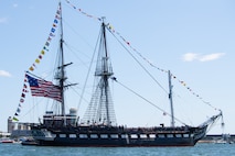 250704-N-UM082-1099 BOSTON (July 4, 2025) – USS Constitution sails in Boston Harbor in honor of Independence Day. USS Constitution is the world’s oldest commissioned warship afloat and serves as America’s Ship of State. She played a crucial role in the Barbary Wars and the War of 1812, actively defending sea lanes from 1797 to 1855. During normal operations, the active-duty Sailors stationed aboard USS Constitution provide free tours and welcome more than 600,000 visitors annually, supporting the ship’s mission of promoting the Navy’s history and maritime heritage, and raising awareness of the importance of a sustained naval presence. USS Constitution was undefeated in battle, having destroyed or captured 33 enemy vessels. She earned the nickname Old Ironsides during the War of 1812, when British cannonballs were seen bouncing off her wooden hull. (U.S. Navy photo by Mass Communication Specialist 1st Class Raymond Minami/Released)