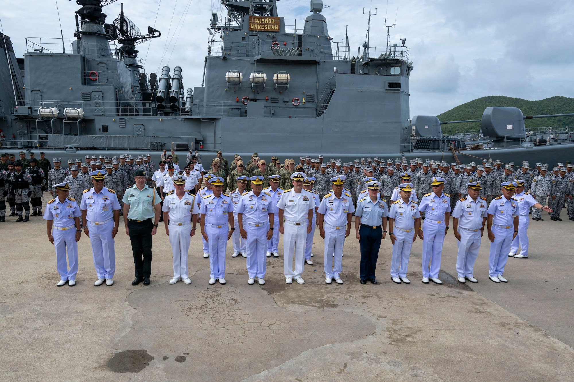 Heads of delegation representing the United States, Thailand, and Canada pose for a photo during the opening ceremony of exercise Cooperation Afloat Readiness and Training (CARAT) Thailand 2026, July 6, 2026, at Laem Tian Pier. This year marks the 32nd iteration of CARAT, a multinational exercise series designed to enhance U.S. and partner navies' abilities to operate together in response to shared maritime security challenges in the region. (U.S. Navy photo by Mass Communication Specialist 2nd Class Nicholas Rodriguez)