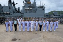 Heads of delegation representing the United States, Thailand, and Canada pose for a photo during the opening ceremony of exercise Cooperation Afloat Readiness and Training (CARAT) Thailand 2026, July 6, 2026, at Laem Tian Pier.