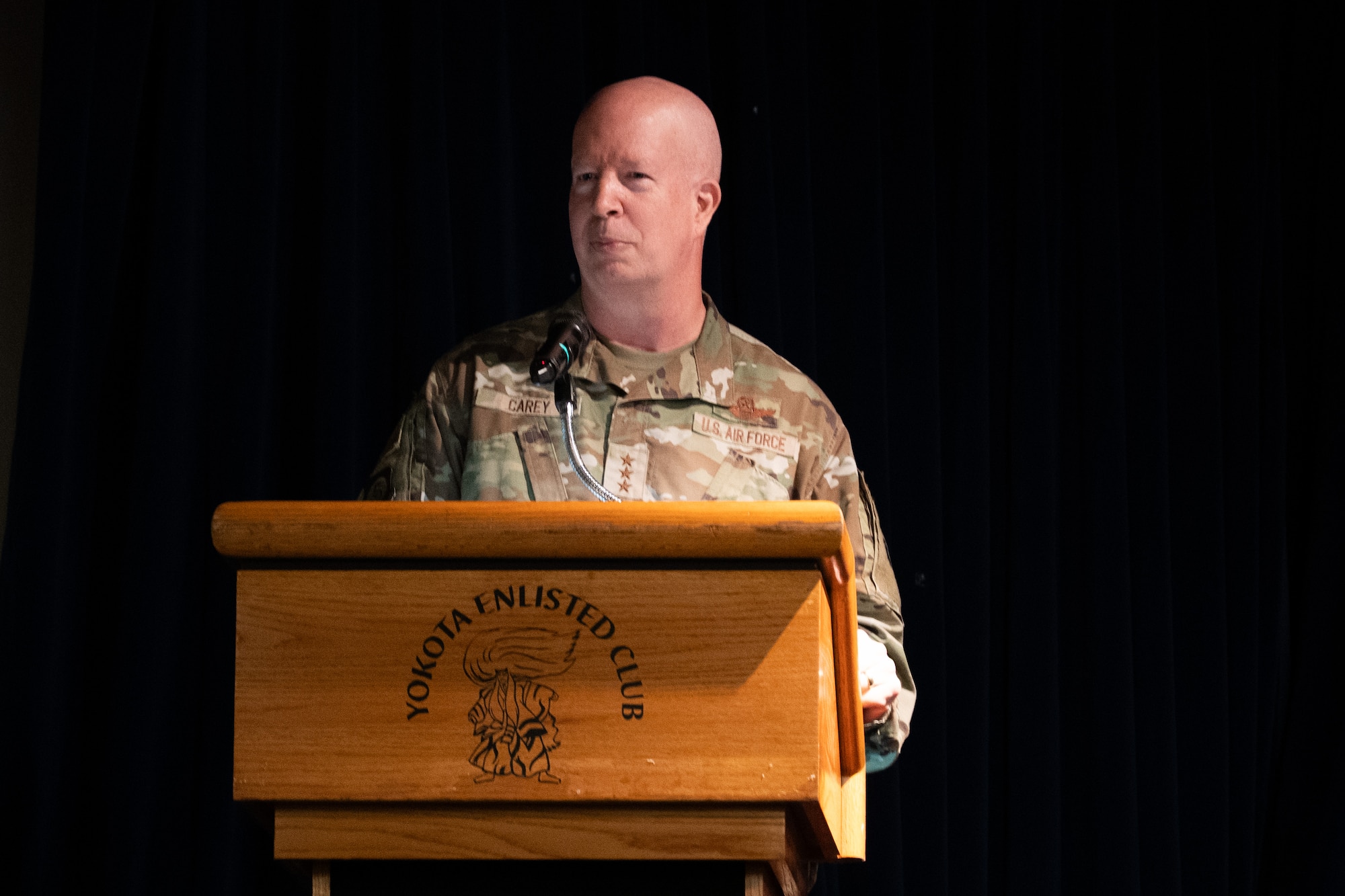 Chief Master Sergeant Andrew Small gives remarks after assumed responsibility as the command chief for 5th Air Force during an assumption of responsibility ceremony at the Yokota Enlisted Club on on July 7, 2026.