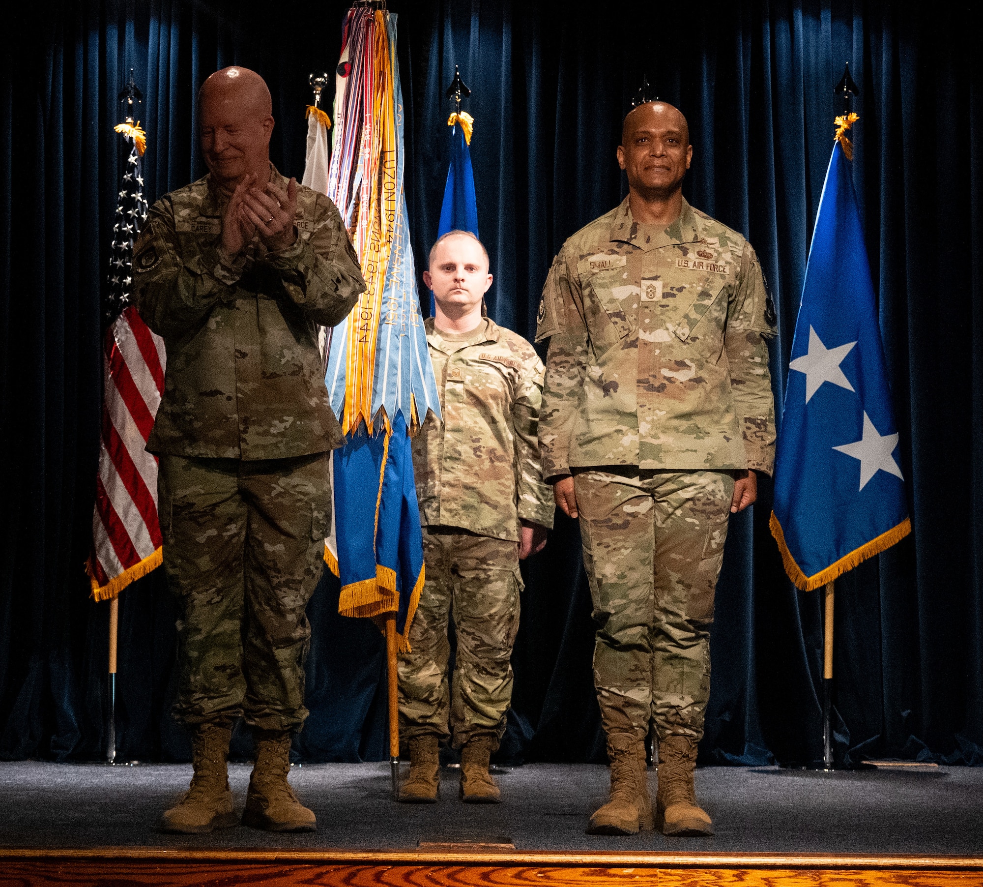 Chief Master Sergeant Andrew Small gives remarks after assumed responsibility as the command chief for 5th Air Force during an assumption of responsibility ceremony at the Yokota Enlisted Club on on July 7, 2026.