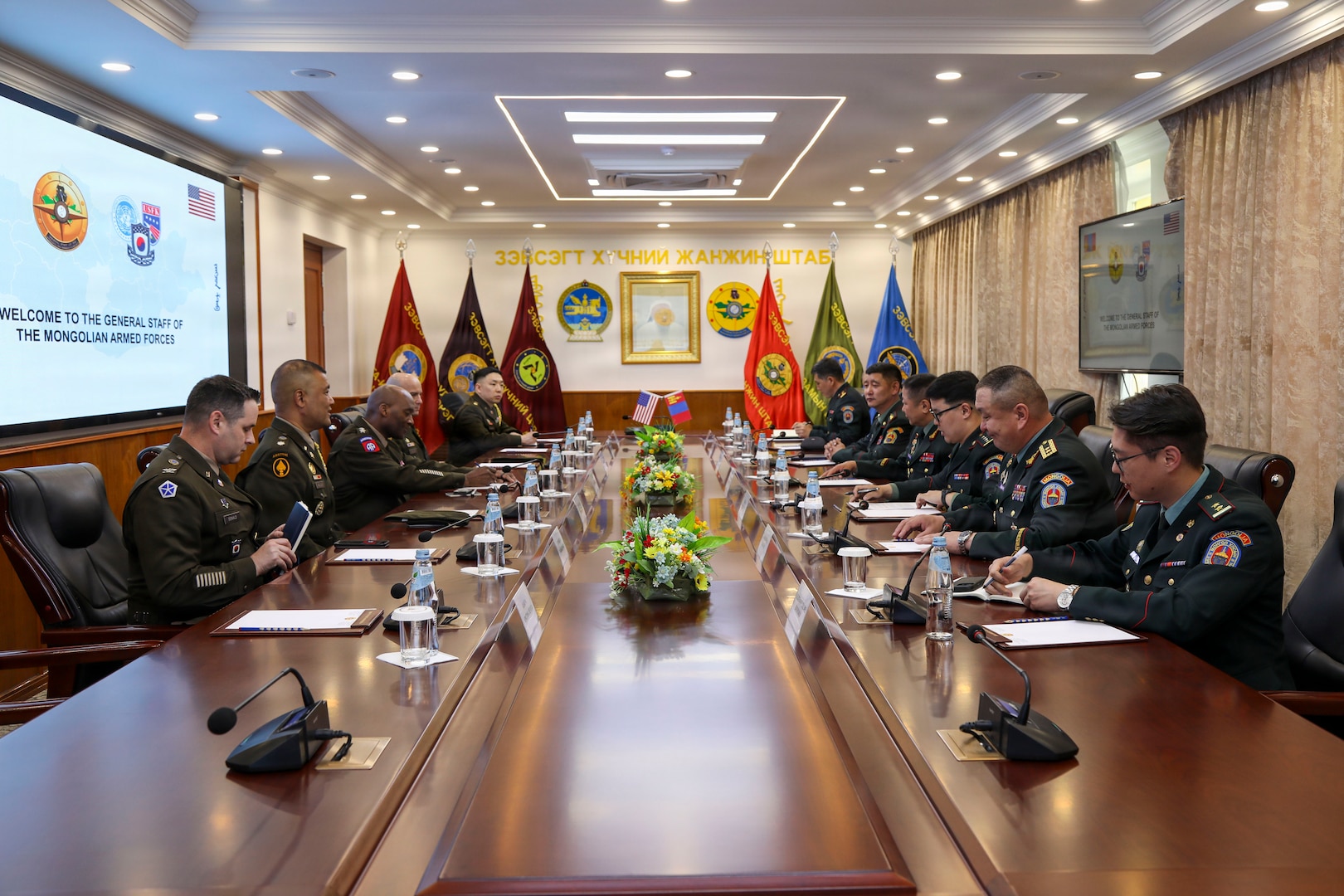 U.S. Army Gen. Xavier T. Brunson and Mongolian Lt. Gen. Sunrev Ganbyamba stand together during a bilateral meeting in Ulaanbataar, Mongolia, reinforcing the nations' security partnership.