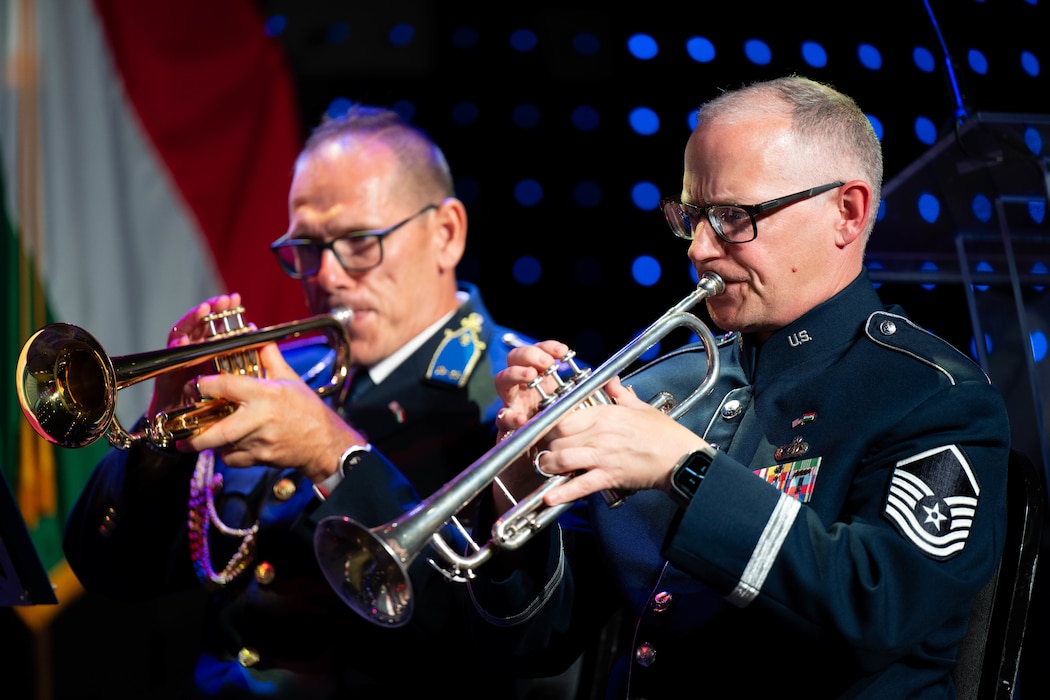 U.S. Air Force Master Sgt. Matthew Kirkpatrick, United States Air Forces in Europe, Air Forces Africa, Bandsmen performs with the Hungarian Riot Police band during a Freedom 250 event in Budapest, July 2, 2026.