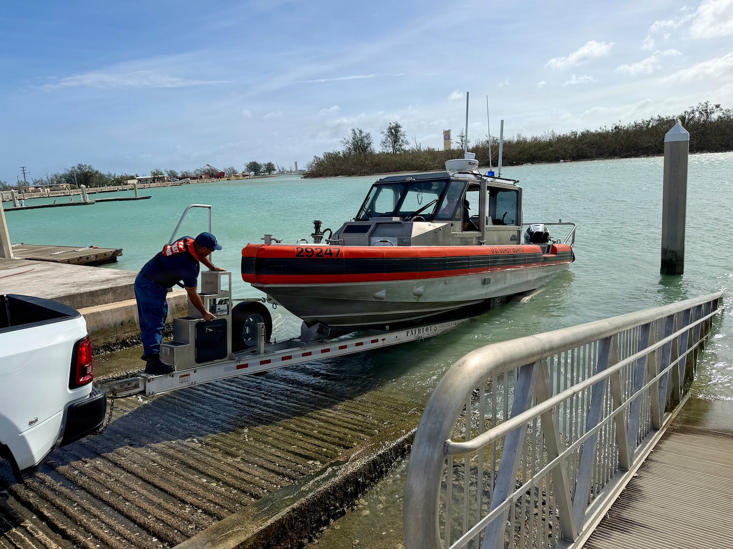 U.S. Coast Guard crews conduct damage assessments in Guam and the Commonwealth of the Northern Mariana Islands on July 7, 2026, to assess conditions and infrastructure. U.S. Coast Guard crews continue to assess aids to navigation, waterways, and channel conditions across the Marianas following Super Typhoon Bavi, working toward reopening ports to daylight operations as soon as it is safe to do so. (U.S. Coast Guard photo)