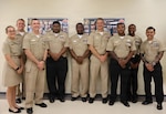 NAVAL AIR STATION SIGONELLA, Italy (June 9, 2026) Senior Chief Hospital Corpsman Essozimna Andjo (center) poses for a group photo with Naval Medical Research Unit (NAMRU) EURAFCENT members. NAMRU EURAFCENT, part of Navy Medicine Research & Development, conducts research, surveillance and studies of vaccines, therapeutic agents, diagnostic assays and vector control measures in the EUCOM, AFRICOM and CENTCOM areas of responsibility to better prevent and treat infectious diseases in support of Navy, Marine Corps and joint U.S. warfighter health, readiness and lethality. (U.S. Navy photo by Tiziana Consoli/Released)