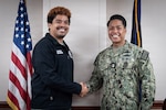Mr. Brandon Coyle receives a coin from Navy Force Master Chief PatrickPaul “PaP” C. Mangaran, command senior enlisted leader for the Defense Health Agency, in recognition of his exceptional service aboard Naval Health Clinic Cherry Point as the Senior Dental Administrator. Mangaran toured NHCCP for an update on latest development to facilities for patients and staff.  NHCCP serves as the keystone of medical readiness for units assigned to Marine Corps Air Station Cherry Point.