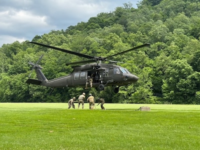 Soldiers assigned to the 131st Aviation Regiment prepare a sling load for hookup during annual training at Camp Dawson, West Virginia, June 4, 2026.