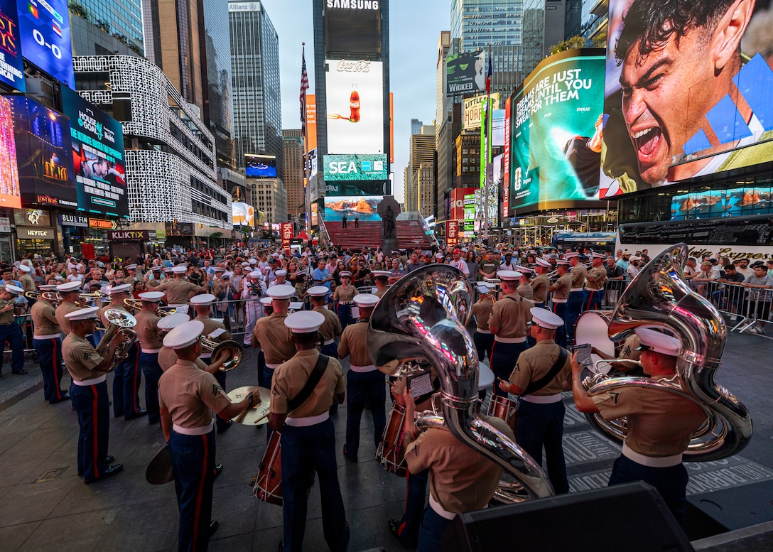 260702-N-FY193-1687 NEW YORK (July 2, 2026)
The U.S. Marine Corps 2nd Marine Division Band entertains a crowd in Times Square, during International Naval Review 250, July 2, 2026. For 250 years, our Navy and Marine Corps stood the watch – constant, unabated in mission, faithfully preventing crisis and resolute in defending America's independence. International Naval Review 250 honors the Navy, Marine Corps, and Coast Guard's enduring role on, under, and above the seas. (U.S. Navy photo by Mass Communication Specialist 2nd Class Mike Shen)