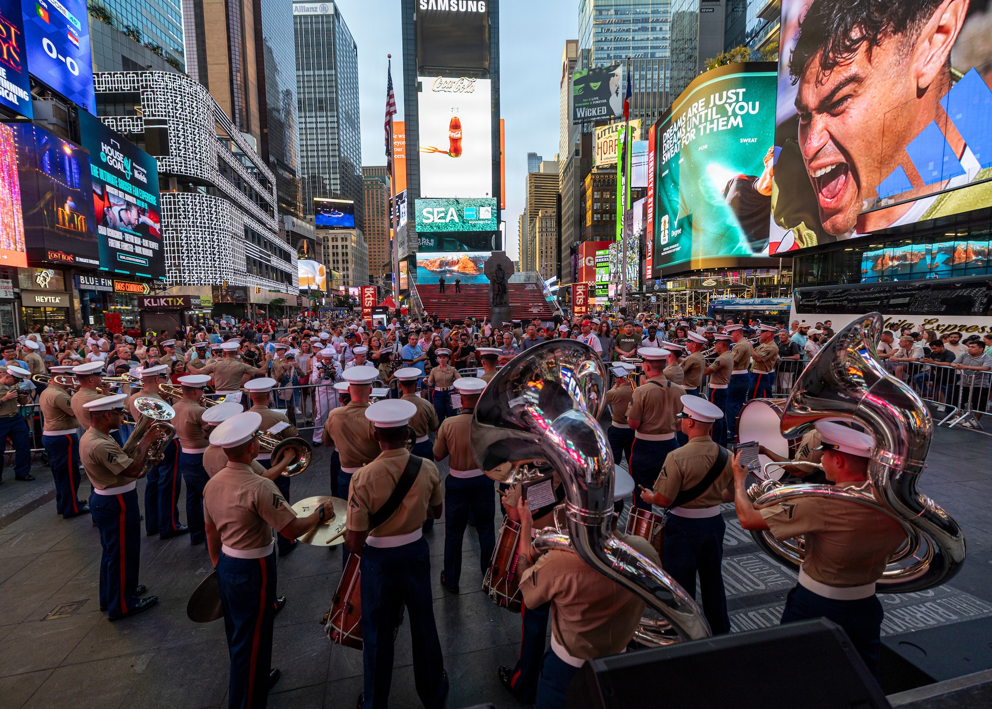 260702-N-FY193-1687 NEW YORK (July 2, 2026)
The U.S. Marine Corps 2nd Marine Division Band entertains a crowd in Times Square, during International Naval Review 250, July 2, 2026. For 250 years, our Navy and Marine Corps stood the watch – constant, unabated in mission, faithfully preventing crisis and resolute in defending America's independence. International Naval Review 250 honors the Navy, Marine Corps, and Coast Guard's enduring role on, under, and above the seas. (U.S. Navy photo by Mass Communication Specialist 2nd Class Mike Shen)