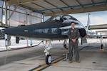 U.S. Air Force Capt. Steven Snyder, 435th Fighter Training Squadron executive officer and instructor pilot, poses for a photo in front of a T-38C Talon on the flightline at Joint Base San Antonio-Randolph, Texas, June 16, 2026. Snyder has been training future instructor pilots at JBSA-Randolph since October 2025. (U.S. Air Force photo by Airman 1st Class Kevin Jones)