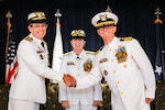(Left to right) U.S. Coast Guard Capt. Jennifer T. Loth, outgoing commanding officer, Coast Guard Reserve Unit United States Northern Command; Rear Adm. Tiffany Danko, assistant commandant for Workforce Management; and Capt. Ian G. Brosnan, incoming commanding officer, stand together during the CGRU USNORTHCOM change of command ceremony at Peterson Space Force Base, June 12, 2026. During the ceremony, Loth transferred command to Brosnan. (Courtesy photo by Jhomil Bansil)