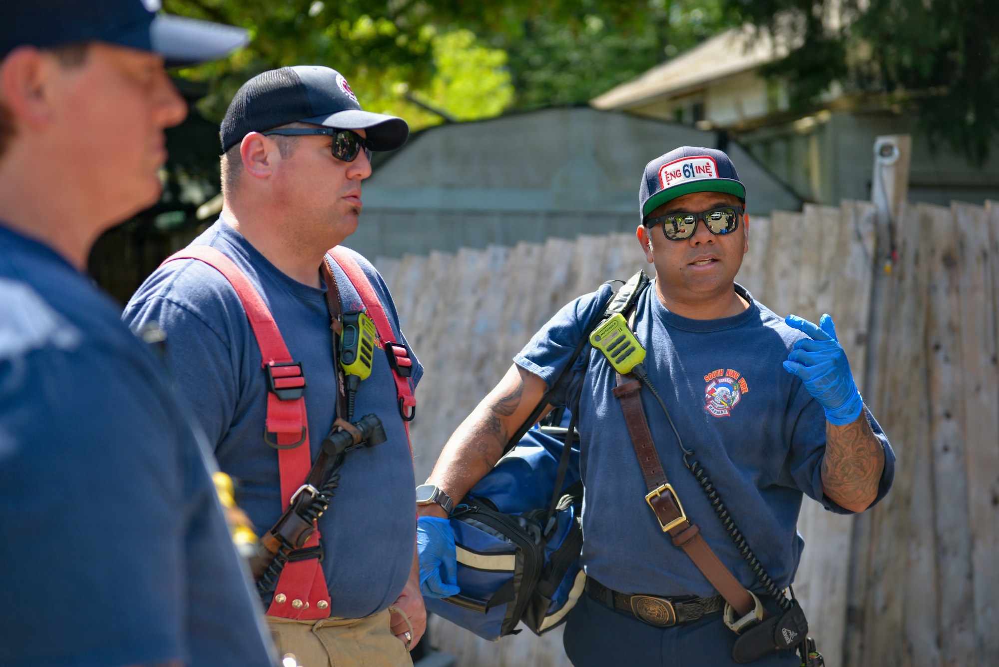 Firefighters talk during work