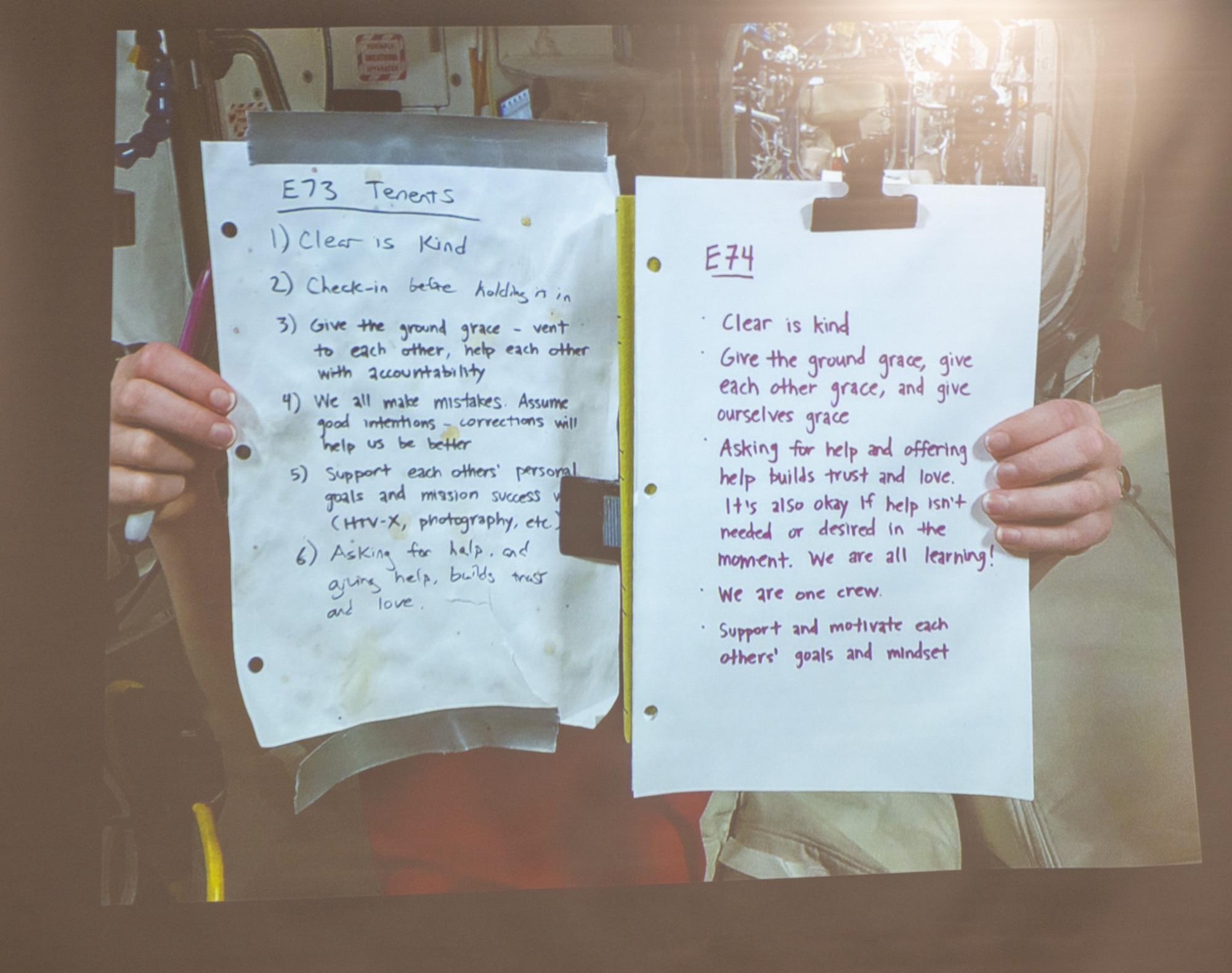 Retired U.S. Air Force Col. and NASA astronaut Michael Fincke shared a photo of the ground rules for working together that his crew of Expedition 73/74 created for their mission aboard the International Space Station during his presentation at Joint Base McGuire-Dix-Lakehurst, N.J., June 22, 2026. Fincke explained how giving yourself and everyone on the team grace worked well for the crew and contributed to the success of the mission. (U.S. Air Force photo by Susan Moriarty)