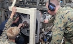 Building on the success of RIMPAC 2024, NPS’ Consortium for Advanced Manufacturing Research and Education (CAMRE) is heading back to Hawaii for RIMPAC 2026 with their largest, most ambitious at sea effort to date, including state-of-the-art advanced manufacturing (AM) systems aboard multiple ships and ashore, as the team explores cutting-edge AM capabilities, networks and advanced operations integrated with autonomous vehicles. Pictured here, the CAMRE team produced and installed a 3D-printed stainless steel reverse osmosis pump sprocket bushing aboard USS Somerset (LPD 25) during RIMPAC 2024 to keep the ship fully operational. (U.S. Marine Corps photo)