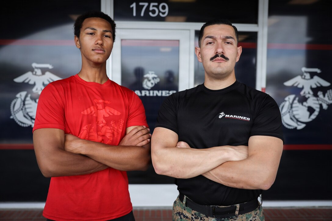 U.S. Marine Corps Sgt. Dominic C. Ortiz, right, a rifleman with Recruiting Station Salt Lake City, 9th Marine Corps District, and his brother, Mercer James, pose for a photo at Recruiting Substation West Salt Lake City in Salt Lake City, Utah, July 1, 2026. (U.S. Marine Corps photo by Cpl. Joseph E. DeMarcus)