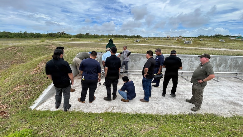 A team views machine gun range equipment as part of a Government Acceptance Test