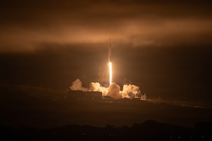 Rocket launches into marina layer.