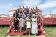 U.S. Army Sgt. Munk Munkhzaya, center, poses for a photo with his parents and fellow Soldiers following his reenlistment ceremony inside a traditional Mongolian ger at Five Hills Training Area, Mongolia, July 2, 2026.