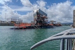 Virginia-class fast-attack submarine USS Illinois (SSN 786) leaves Dry Dock 2 at Pearl Harbor Naval Shipyard and Intermediate Maintenance Facility (PHNSY & IMF), June 24, 2026, completing an important milestone in the submarine’s scheduled lifecycle maintenance period. Commissioned Oct. 29, 2016, Illinois is the 13th Virginia-class submarine. It is the second U.S. Navy ship to be named for the state of Illinois. Illinois is assigned to Submarine Squadron 1 and is capable of supporting various missions, including anti-submarine warfare; anti-surface ship warfare; strike warfare; special operations forces support; and intelligence, surveillance, and reconnaissance. PHNSY & IMF’s mission is to keep the Navy’s fleet “Fit to Fight" by repairing, maintaining, and modernizing the Navy's fast-attack submarines and surface ships. Strategically located in the heart of the Pacific, it is the most comprehensive fleet repair and maintenance facility between the U.S. West Coast and the Far East. (U.S. Navy photo by Kenny Jones)