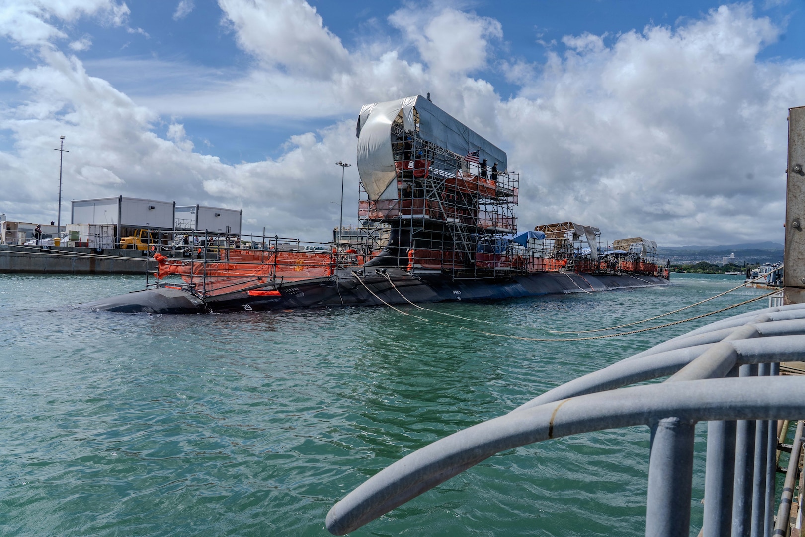 Virginia-class fast-attack submarine USS Illinois (SSN 786) leaves Dry Dock 2 at Pearl Harbor Naval Shipyard and Intermediate Maintenance Facility (PHNSY & IMF), June 24, 2026, completing an important milestone in the submarine’s scheduled lifecycle maintenance period. Commissioned Oct. 29, 2016, Illinois is the 13th Virginia-class submarine. It is the second U.S. Navy ship to be named for the state of Illinois. Illinois is assigned to Submarine Squadron 1 and is capable of supporting various missions, including anti-submarine warfare; anti-surface ship warfare; strike warfare; special operations forces support; and intelligence, surveillance, and reconnaissance. PHNSY & IMF’s mission is to keep the Navy’s fleet “Fit to Fight" by repairing, maintaining, and modernizing the Navy's fast-attack submarines and surface ships. Strategically located in the heart of the Pacific, it is the most comprehensive fleet repair and maintenance facility between the U.S. West Coast and the Far East. (U.S. Navy photo by Kenny Jones)