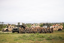 U.S. Marines and Sailors assigned to 3rd Marine Littoral Regiment, 3rd Marine Division, and Philippine marines assigned to 4th Marine Brigade, pose for a photograph after conducting a simulated NMESIS firing mission during KAMANDAG 10 at Calayan, Philippines, June 25, 2026.