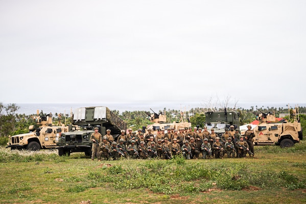 U.S. Marines and Sailors assigned to 3rd Marine Littoral Regiment, 3rd Marine Division, and Philippine marines assigned to 4th Marine Brigade, pose for a photograph after conducting a simulated NMESIS firing mission during KAMANDAG 10 at Calayan, Philippines, June 25, 2026.