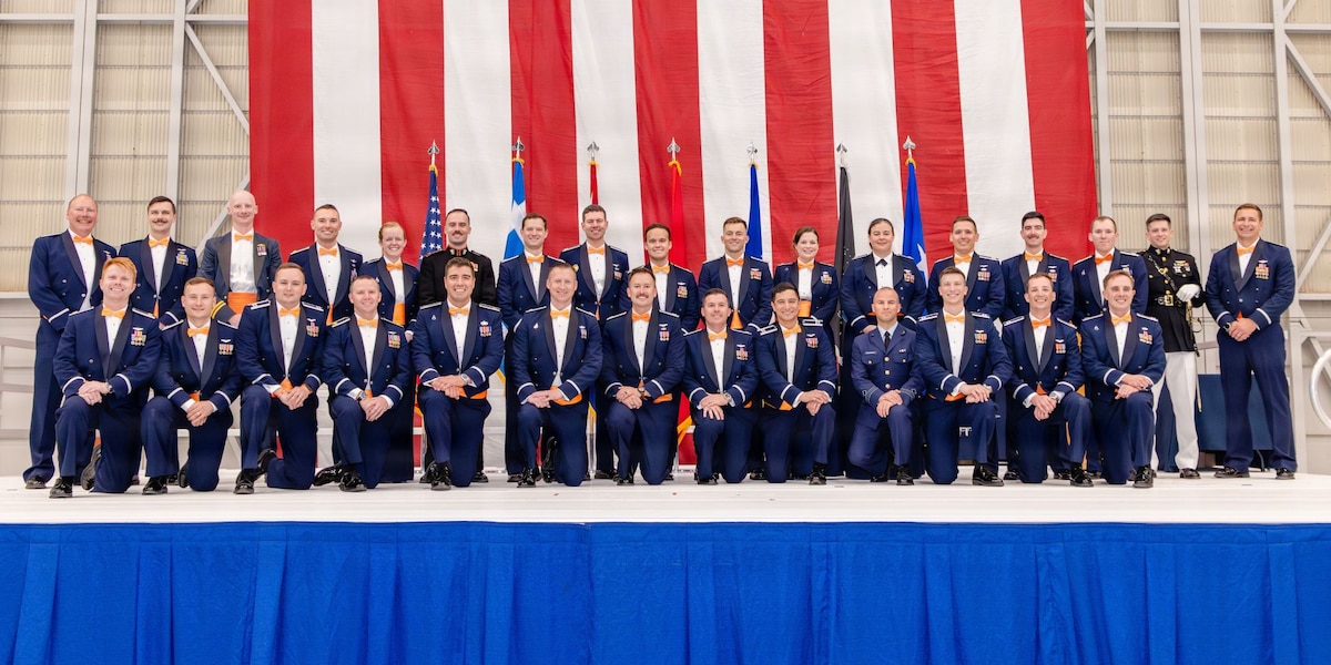 USAF Test Pilot School Class 25B students pose for a portrait following their graduation at Edwards Air Force Base, June 5. The graduating class includes USAF Airmen, USSF Guardians and exchange students representing the Royal Air Force and Hellenic Air Force. (U.S. Air Force photo by Lindsey Iniguez)