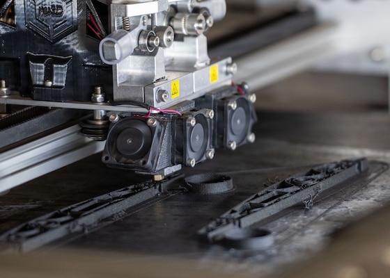 A 3D printer operates during NPS’ latest Joint Interagency Field Experimentation event at Camp Roberts, Calif., May 13, 2026. The demonstration highlights ongoing evaluation of advanced manufacturing systems in a field experimentation environment in preparation for the team’s comprehensive experimentation effort at RIMPAC 2026. (U.S. Navy photo by Mass Communication Specialist Seaman Katherine Eldridge)