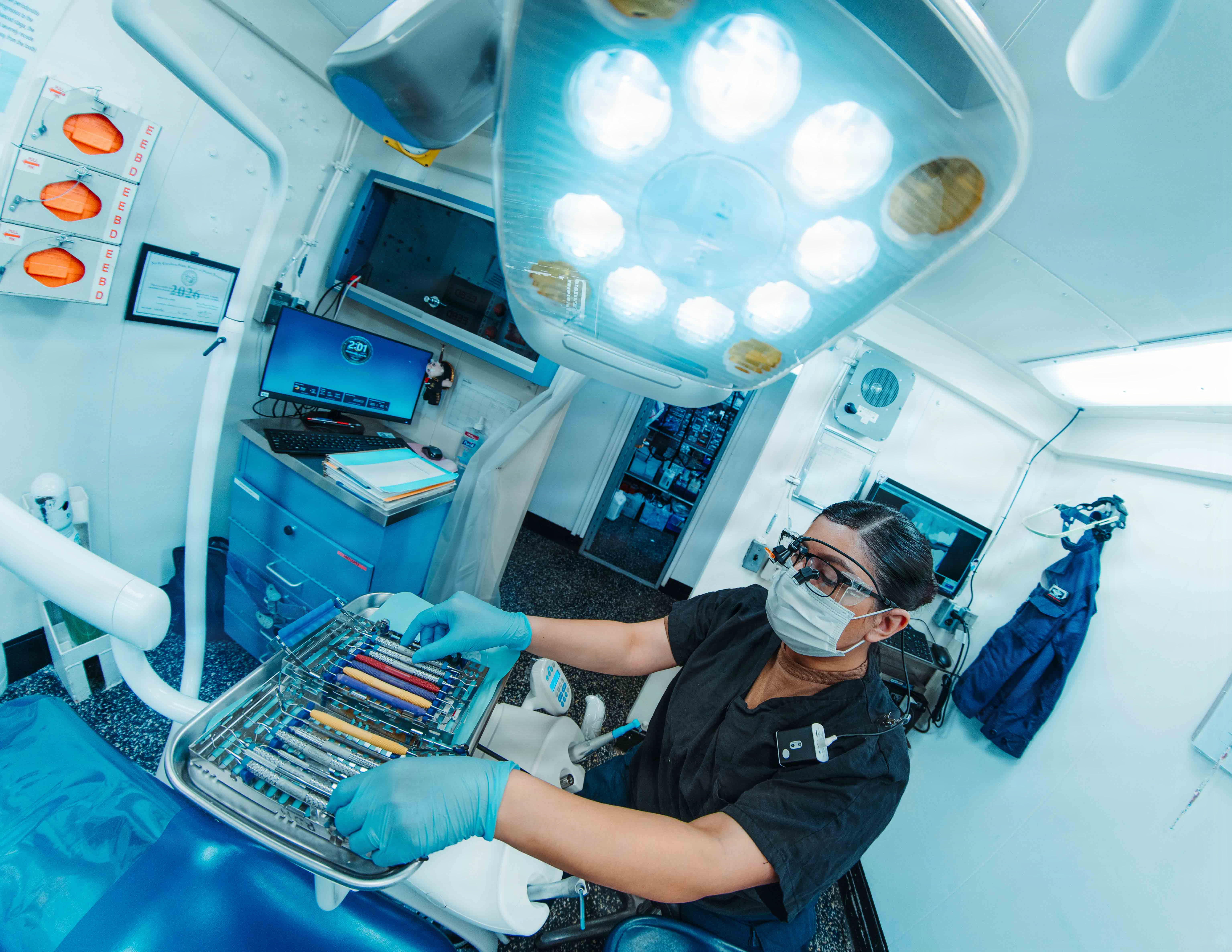 Hospital Corpsman 3rd Class Julissa Lopez, from Texas, assigned to dental department, prepares dental cleaning equipment aboard Nimitz-class aircraft carrier USS George Washington (CVN 73) during Valiant Shield 2026 in the Philippine Sea, June 24, 2026. Valiant Shield is a biennial, multilateral field training exercise conducted by the U.S. Armed Forces and partner nations in the Western Pacific focusing on joint, cross-combatant integration operating seamlessly across sea, air, land, and cyberspace. Exercises like Valiant Shield allow U.S. Pacific Command the opportunity to integrate forces from all branches of service and with our allies to conduct precise, lethal, and overwhelming multi-domain effects that demonstrate the strength and versatility of the Joint Force and our commitment to a free and open Indo-Pacific. (U.S. Navy photo by Mass Communication Specialist 3rd Class Nicolas Quezada)