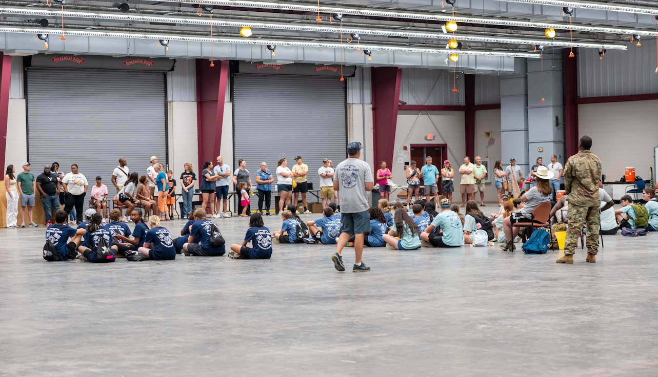 military children attending soldier for a day