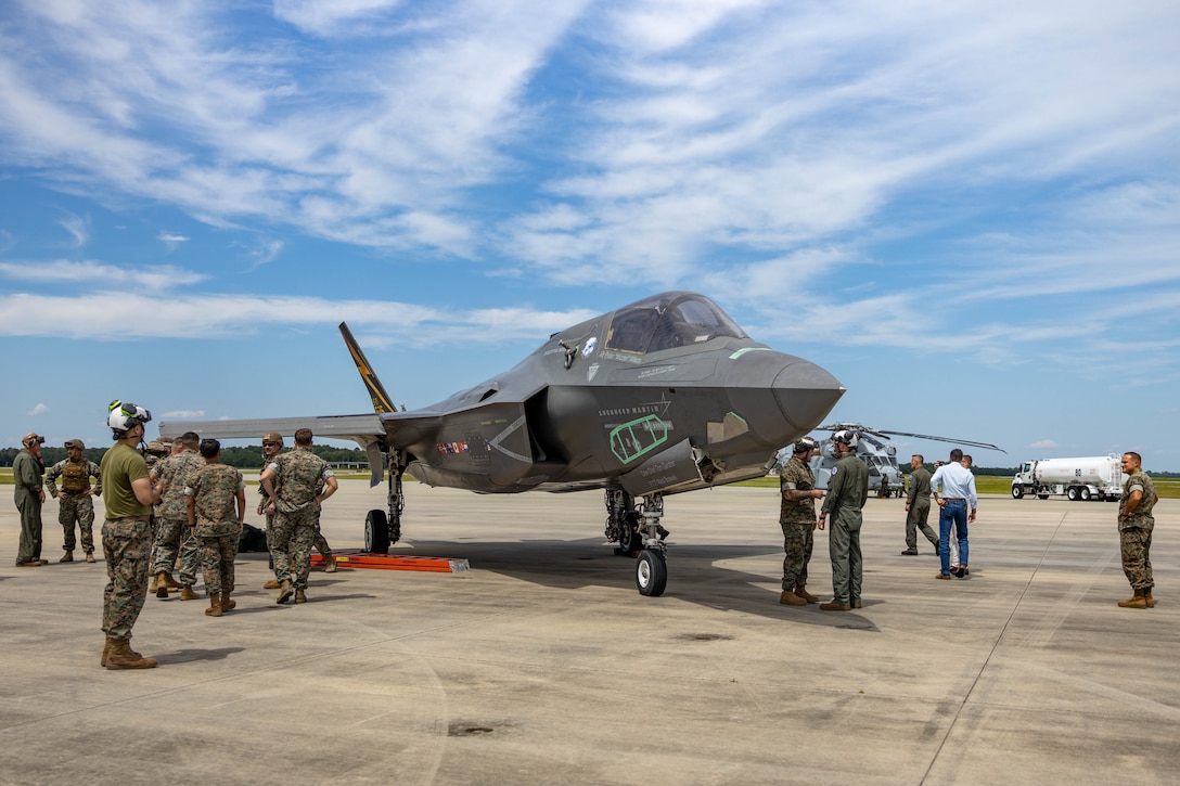 U.S. Marines with Marine Corps Air Station Beaufort prepare the F-35B Lightning II aircraft known as BF-1 to be towed to its static display position at MCAS Beaufort, South Carolina, Aug. 27, 2025. The F-35B Lighting II aircraft, known as BF-1, was the first F-35B Lightning II variant ever built, ushering in a new era for Marine Corps Aviation. (U.S. Marine Corps photo by Lance Cpl. Isabella Renaud)