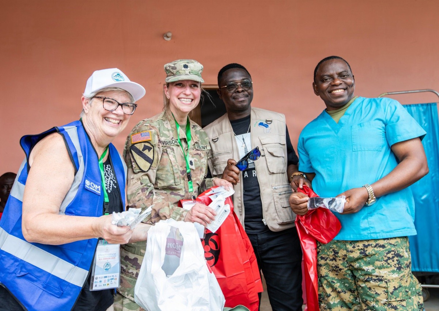 Sherry Adams, left, North Dakota state health officer and Southwestern District Health Unit executive officer, and U.S. Army Lt. Col. Mandy Iverson, second from the left, a plans officer with the North Dakota National Guard Domestic Operations Branch, pose with members of Togo’s National Civil Protection Agency at a medical treatment facility in Agome-Glozou, Togo, June 15, 2026.