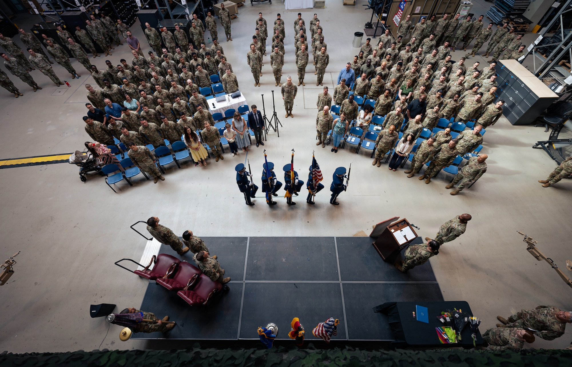 honor guard marches into Change of Command