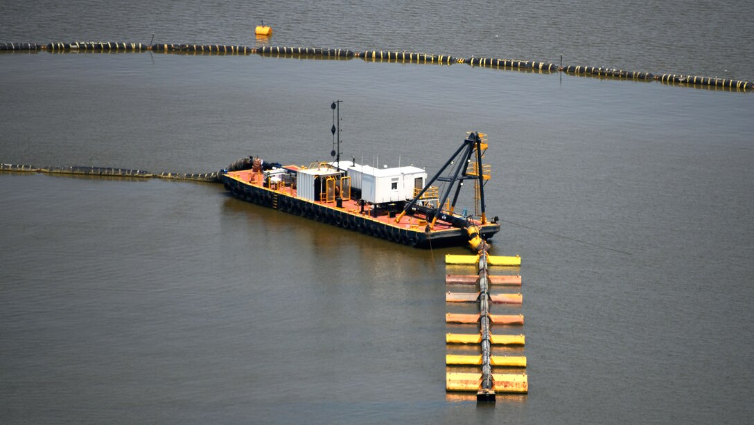 A dredge performs maintenance work in the Mobile Harbor, Mobile, Alabama