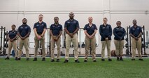 U.S. Airmen pose together for a portrait.