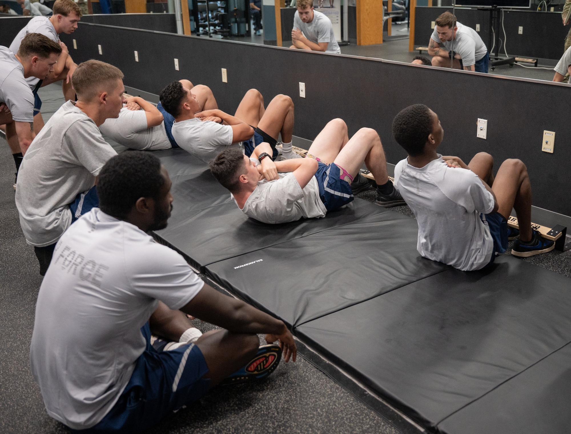 U.S. Airmen participate in the physical fitness readiness assessment.