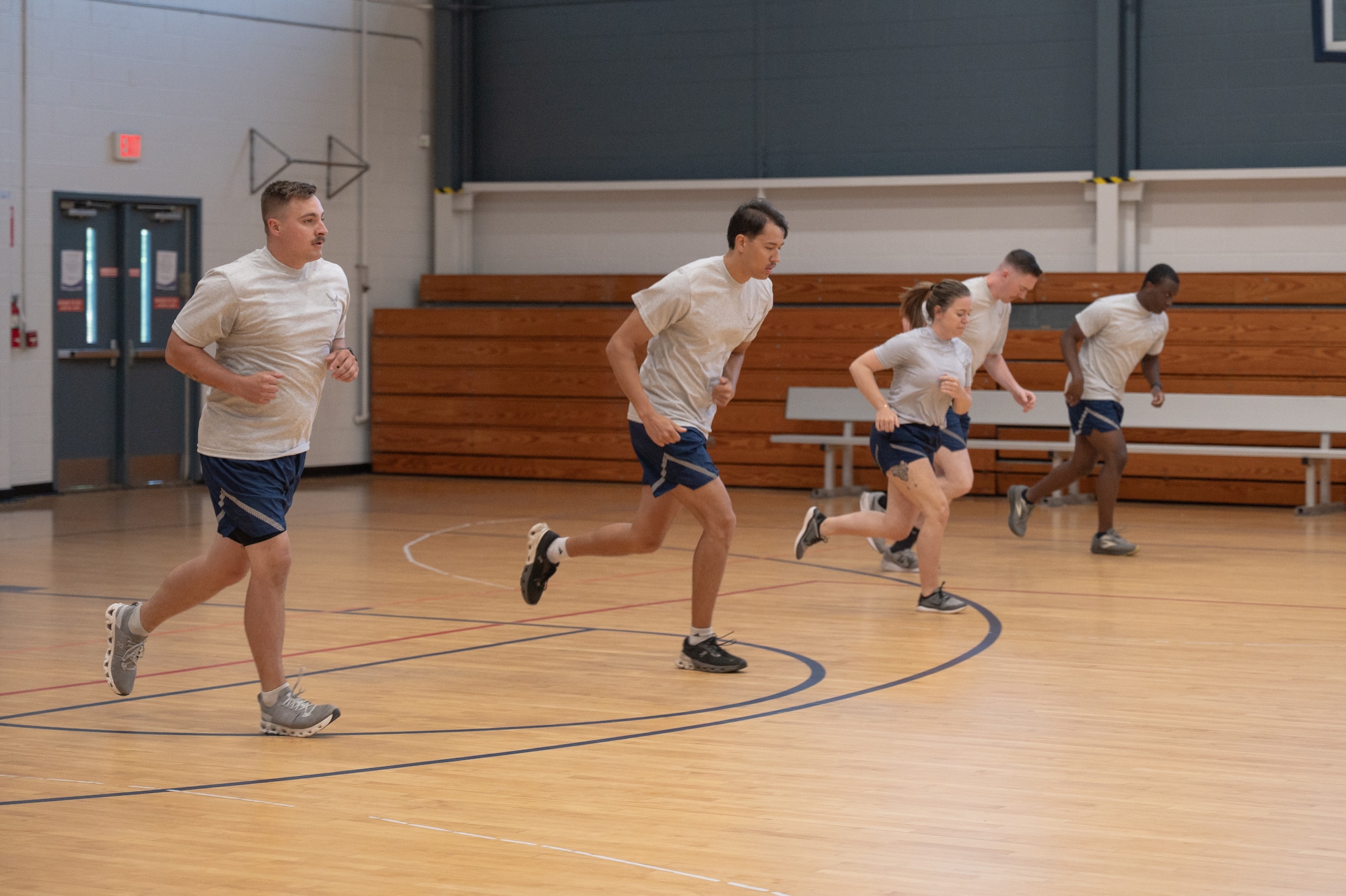 U.S. Airmen participate in the physical fitness readiness assessment.