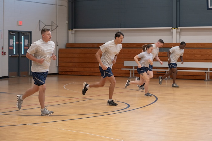 U.S. Airmen participate in the physical fitness readiness assessment.