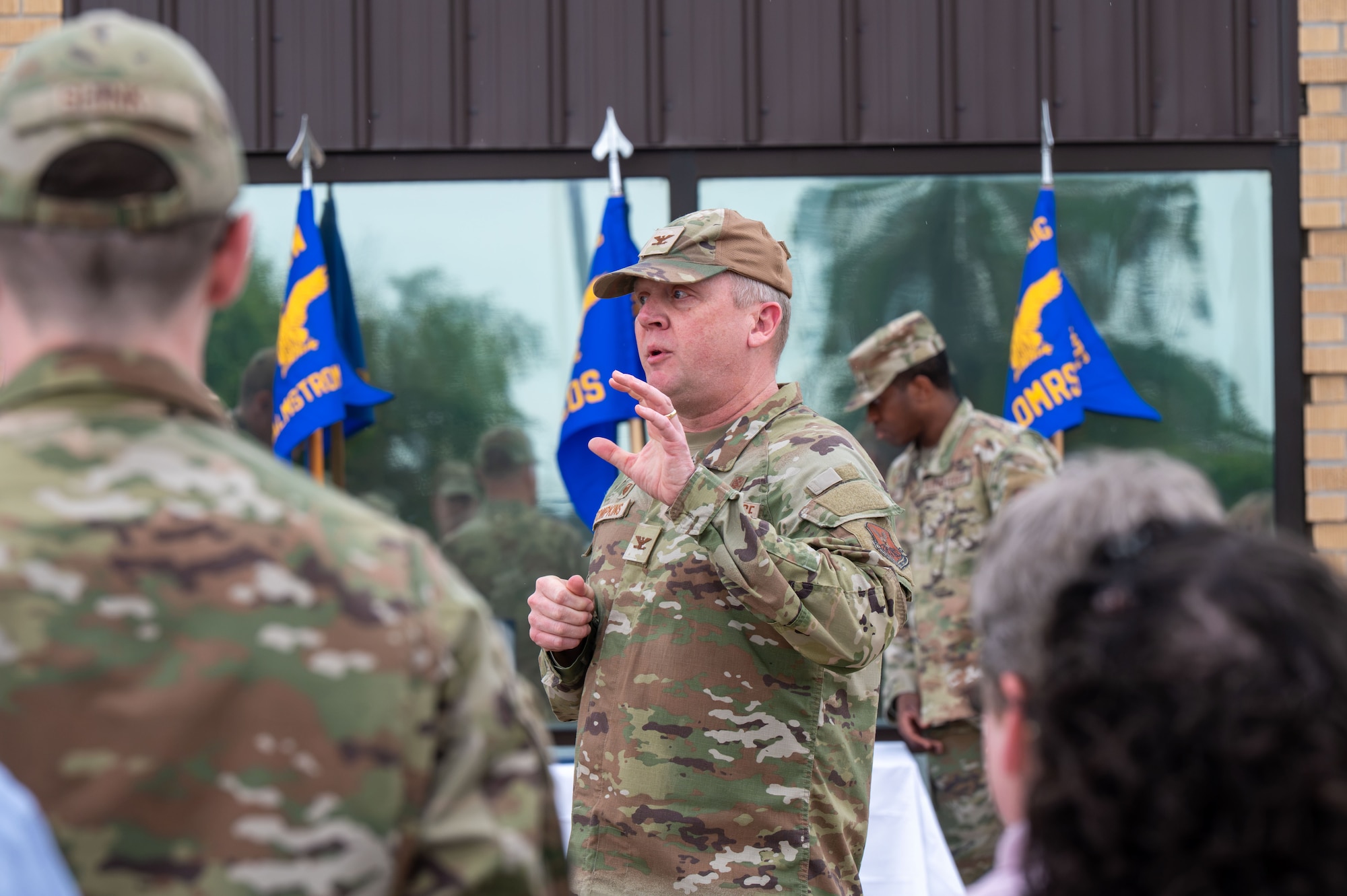 U.S. Air Force Col. Jason Tompkins, Malmstrom Medical Group commander, provides remarks to Malmstrom MDG Airmen during the Air Force Medical Command’s fourth inter-command transfer, at Malmstrom Air Force Base, Montana, June 26, 2026.