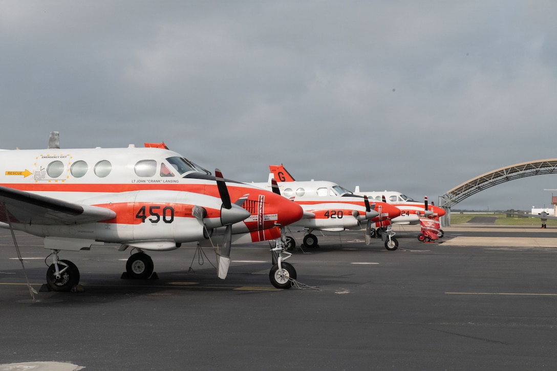T-44C Pegasus assigned to Training Air Wing (TW) 4 remains parked at Naval Air Station (NAS) Corpus Christi, April 28, 2026. Chief of Naval Air Training (CNATRA) oversees the Naval Air Training Command which trains, mentors, and delivers the highest quality naval aviators that win in competition, crisis, and conflict. (U.S. Navy photo by Ensign Jenna Han)