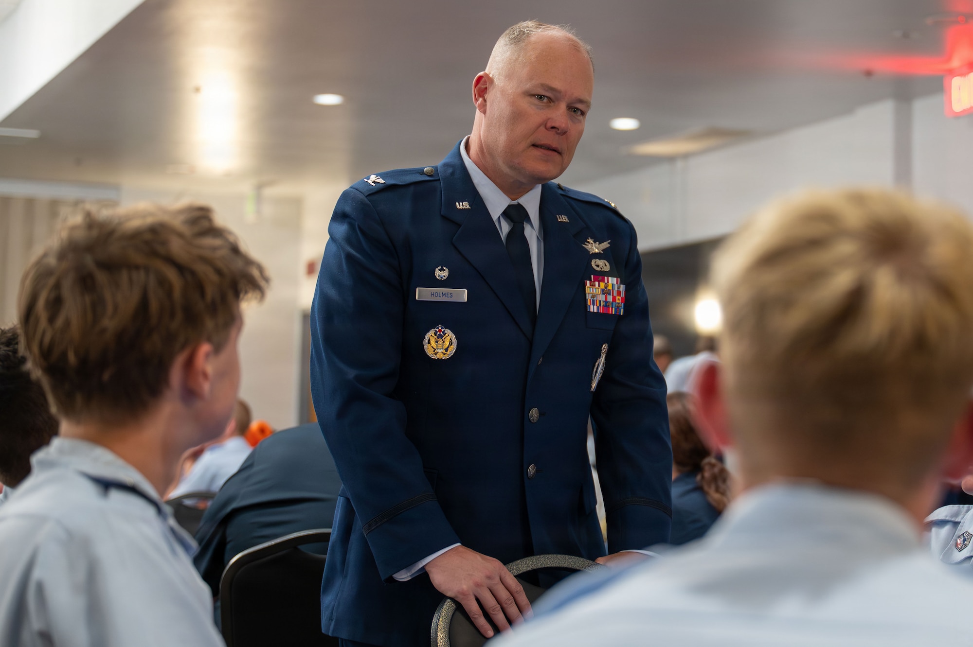 Image of Col. Terrance Holmes speaking with CAP Encampment graduates.