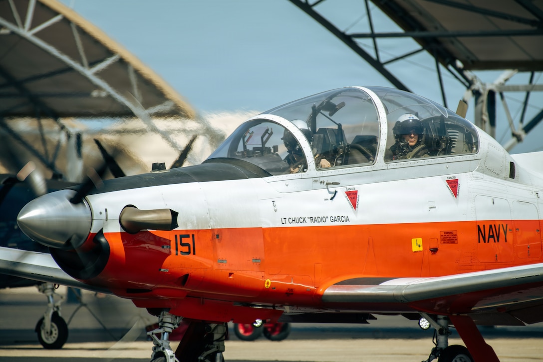 A T-6B Texan II assigned to Training Air Wing (TW-4) FOUR taxis onboard Naval Air Station (NAS) Corpus Christi on March 4, 2026. Chief of Naval Air Training (CNATRA) trains, mentors, and delivers the highest quality Naval Aviators that win in competition, crisis, and conflict. (U.S. Navy photo by Ensign Ryan O'Dea)
