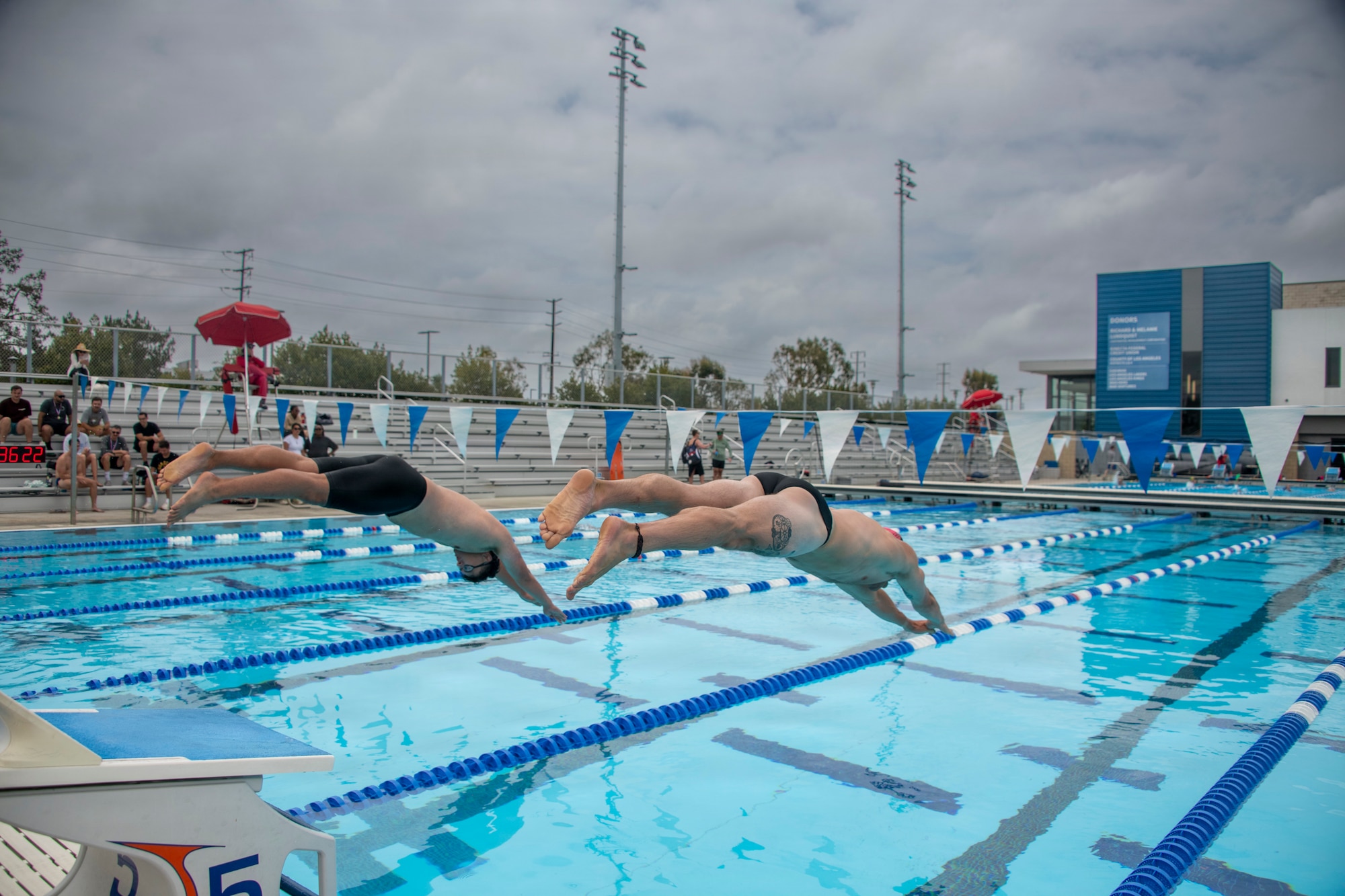 Members of Space Systems Delta 80 compete in a 50-meter swim event during Los Angeles Air Force Base’s 2026 Sports Day at Da Vinci School in El Segundo, California, July 1, 2026.