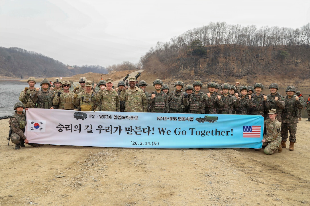 (Front third from left to right) U.S. Army Maj. Gen. Charles T. Lombardo,  commander of 2nd Infantry Division/ROK-U.S. Combined Division, U.S. Army Lt. Gen. Joseph E. Hilbert, commander of 8th Army, U.S. Army Gen. Xavier T. Brunson, commander of United Nations Command, Combined Forces Command, and U.S. Forces Korea, and Republic of Korea Gen. Sungmin Kim, deputy commander of Combined Forces Command, pose for a group photo with U.S. and South Korean troops during Freedom Shield 26 near Yeoncheon, South Korea,